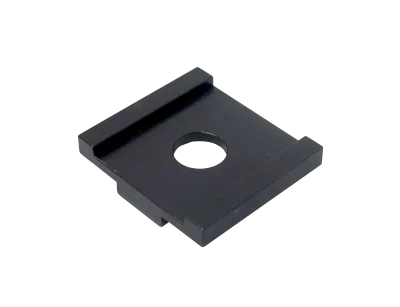 A rotation stop plate for a modular clamping system workholding clamp.